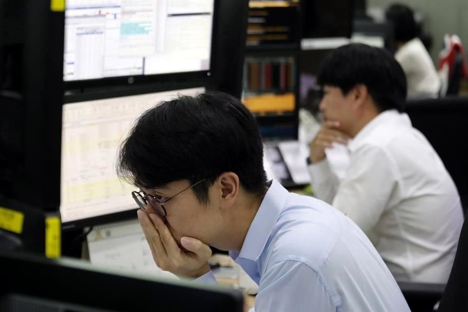 Operador de divisas en Hong Kong.