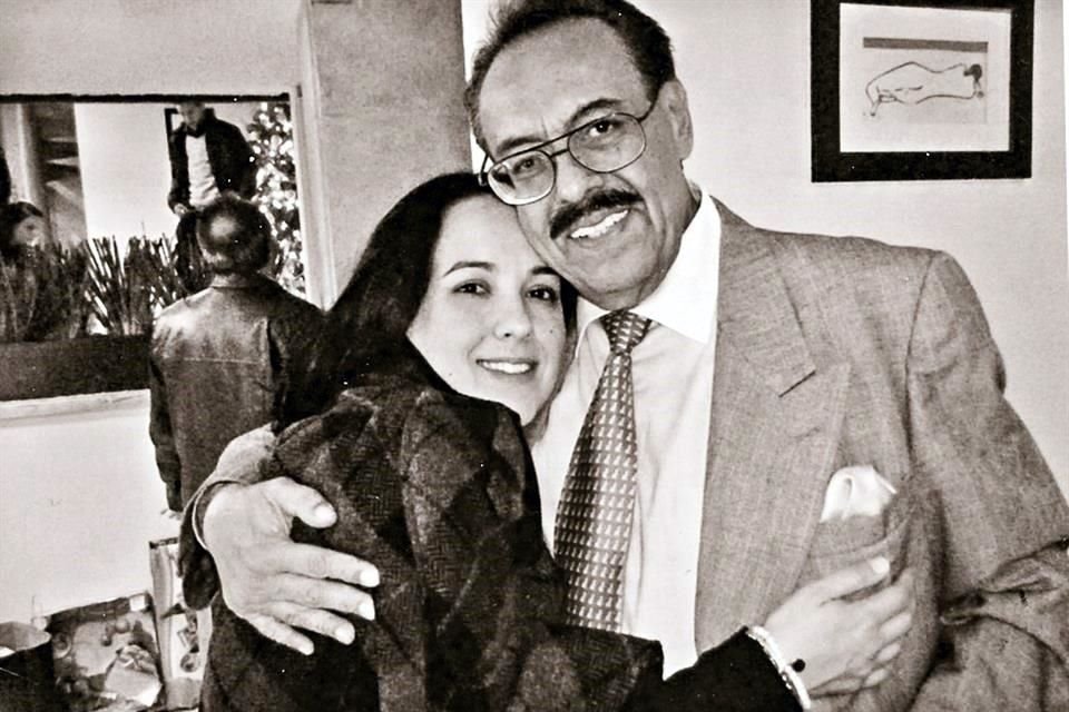 En 2015, con su hija, en una reunión para celebrar Navidad.