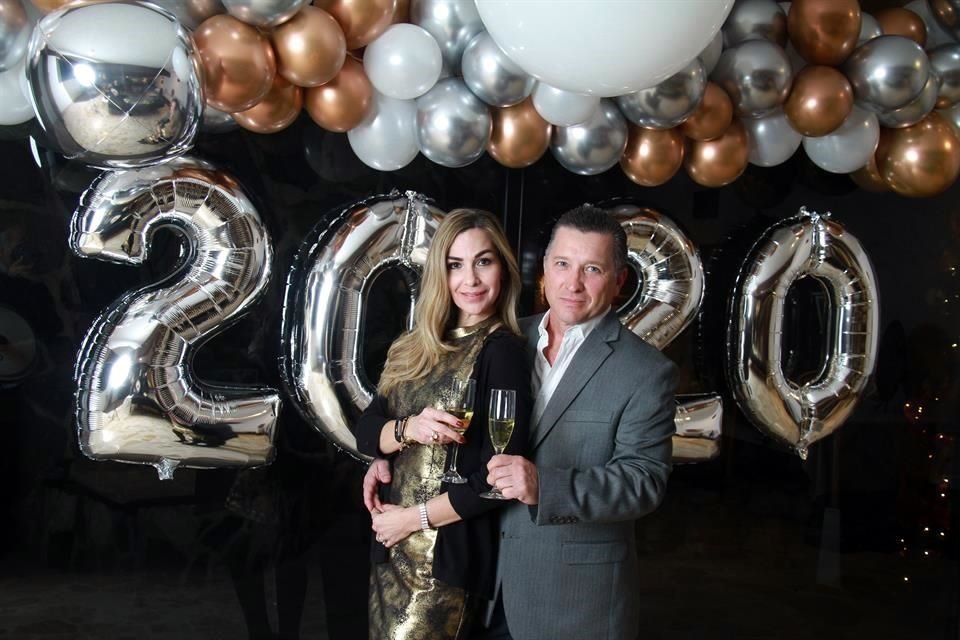 Ana Elisa Garza de Flores y Luis Flores Garza