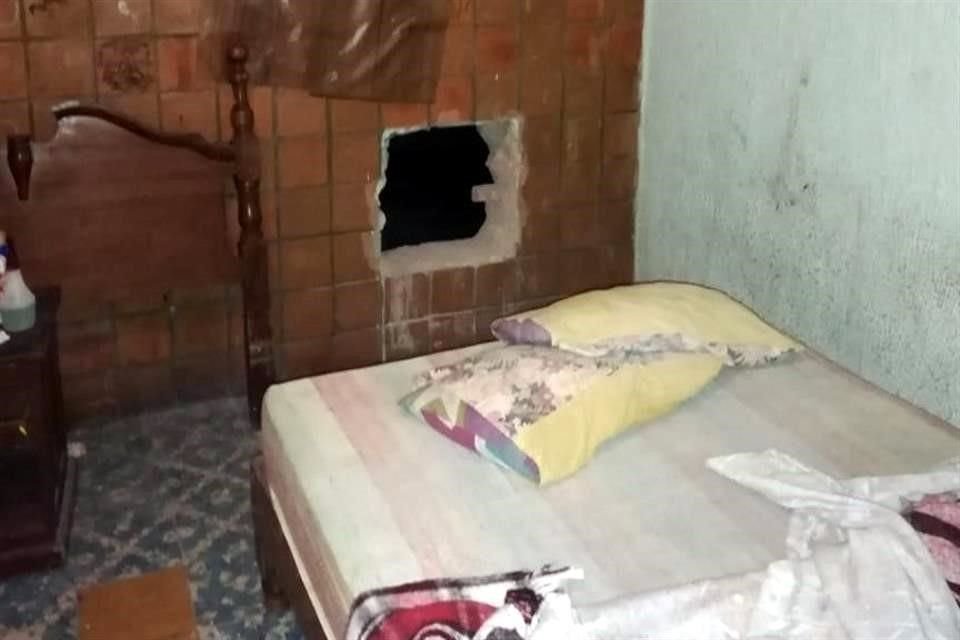 Los hombres entraron al cuarto del hotel para abrir un boquete que los llevaba a la casa de empeño.