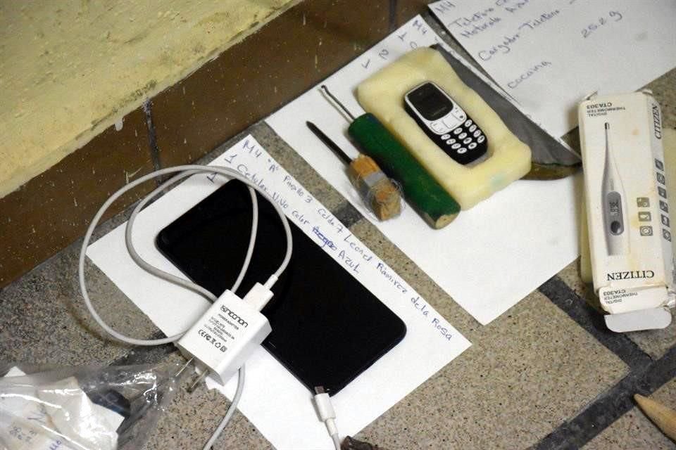 También fueron localizados teléfonos celulares.